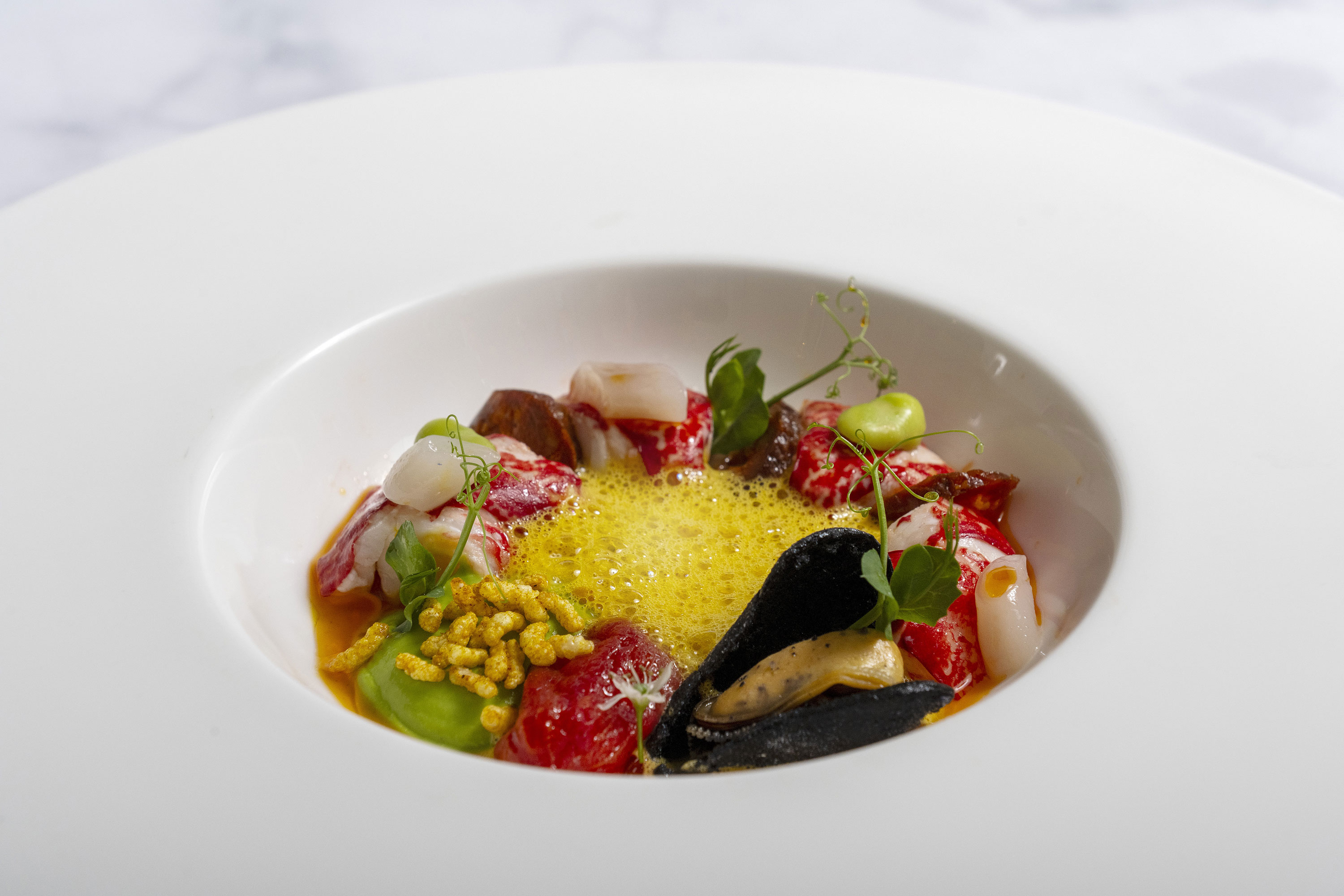 Meeresfrüchte-Gericht Ein Meeresfrüchte-Gericht, das die Augen und den Gaumen gleichermaßen verwöhnt.